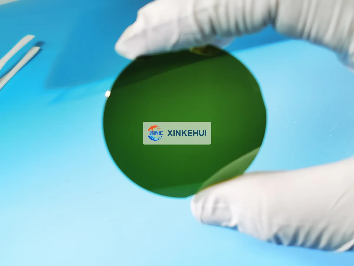 Representative polished SiC wafer with green appearance under ambient lighting